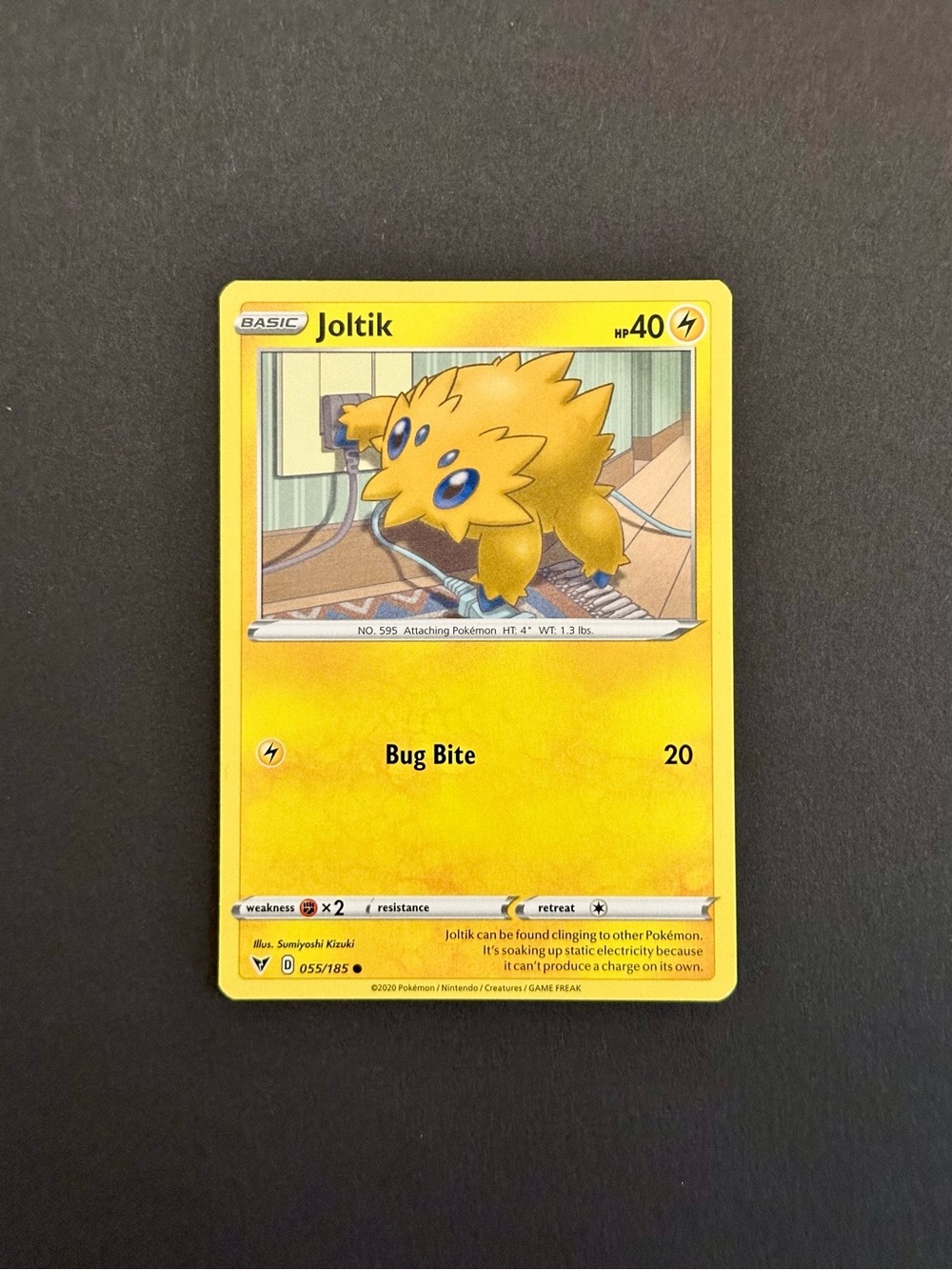 Joltik Pokémon Card - 055/185 Vivid Voltage